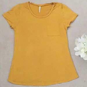 Yellow top with pocket